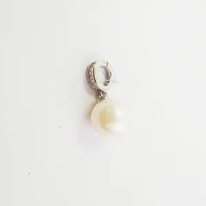 Pearl pendant clasp bail detail with pave zircon and white pearl close-up view accessory