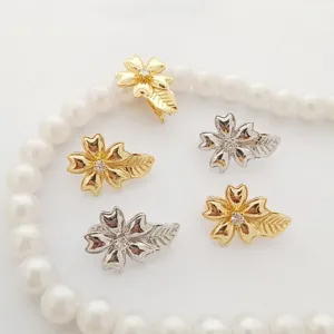 Pearl necklace clasp flower design metal DIY jewelry accessory detailed close-up shot.
