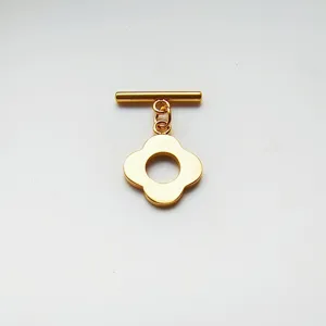 Gold stainless steel four leaf clover OT clasp detail view for DIY pearl necklace connection.