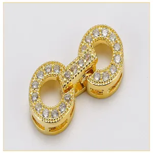 Micro-paved cubic zirconia jewelry clasp detail shot, gold-plated DIY necklace connector.