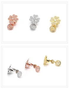 Detailed view of magnetic four-leaf clover sweater chain clasp, rhinestone jewelry accessories.