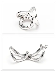 Silver pearl necklace clasp detail view, metal multi-loop jewelry connector accessory.