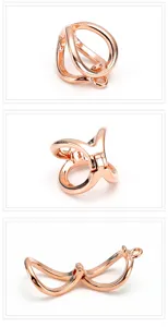 Close-up detail of rose gold multi-strand pearl necklace clasp connector finding for DIY jewelry.