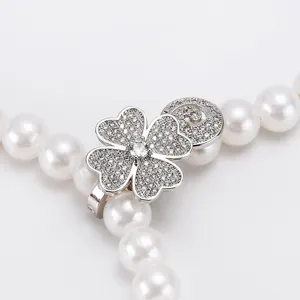 Magnetic clover sweater chain clasp DIY jewelry accessory for elegant pearl necklaces.
