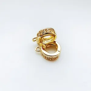 Gold micro-set DIY jewelry connector bail for pearl necklaces and sweater chains.