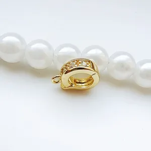 Gold micro-set D universal clasp connector for pearl necklace DIY jewelry making detail.