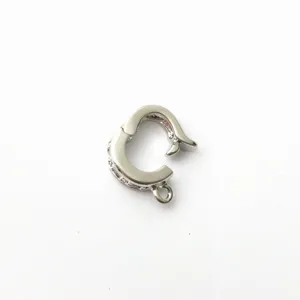Detail shot of a silver DIY necklace connector clasp, universal D buckle for jewelry making.