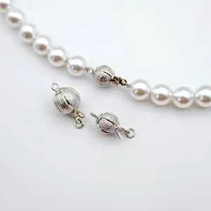 Matte spherical clasp detail for DIY pearl necklaces, featuring exquisite shimmer sand texture.