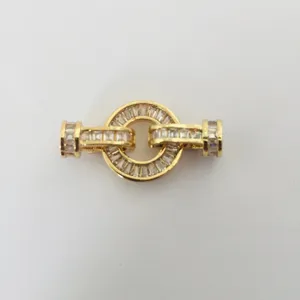 Detailed shot of gold-plated DIY necklace clasp with sparkling baguette cubic zirconia.