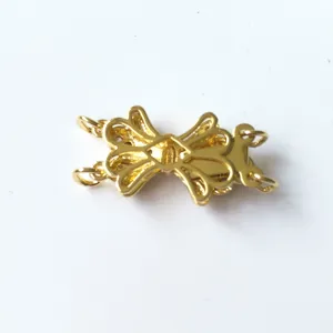 Gold plated multi strand necklace clasp connector detail shot, exquisite filigree jewelry finding.