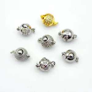 Detailed cubic zirconia ball clasps, gold and silver DIY jewelry findings for necklaces.
