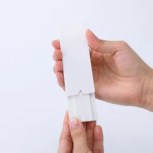 White plastic power strip wall mount holder, punch-free socket fixator main display view.