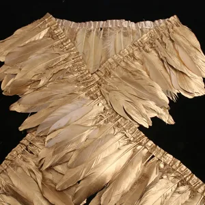 Gold feather trim detail view, DIY clothing accessories and home decor fringe trim.