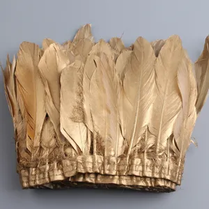 Golden feather trim ribbon for DIY clothing accessories, crafts, and home decor sewing projects.