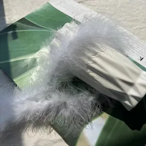 White fluffy feather boa for wedding festive decoration, clothing and box accessory, 2m length.