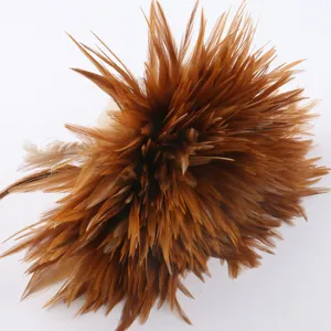 Detailed close-up of brown fluffy craft feathers, perfect for DIY headwear and dreamcatchers.