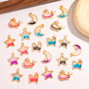 Gedetailleerd overzicht van DIY gradiënt legering ster maan walvis vlinder hanger.