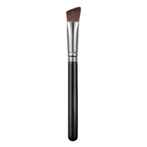 Professional angled makeup brush for precise concealer and highlighter application.