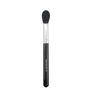 Detailed view of the tapered highlighter makeup brush with soft black bristles and silver ferrule.