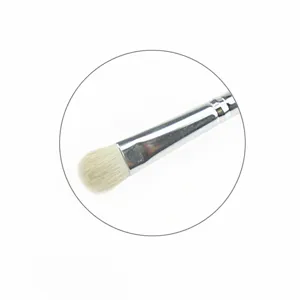 Close-up detail of soft wool eyeshadow brush tip for precise eye makeup blending and shading.