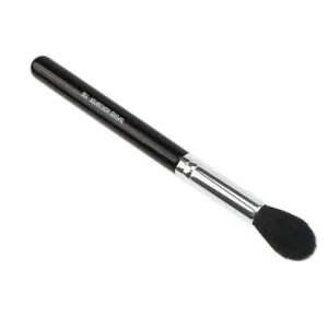 Detailed close-up of the tapered makeup highlighter brush featuring soft black bristles and handle.