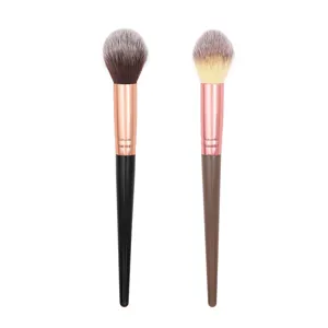 Professional makeup highlighter blush brush set with soft synthetic bristles and rose gold handles.