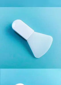 Mini siliconen gezichtsmasker borstel detail, draagbaar plat cosmetisch hulpmiddel huidverzorging.