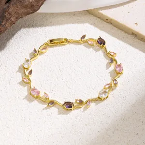 Detailed view of exquisite gold-plated multi-color zircon leaf vine bracelet fashion jewelry.