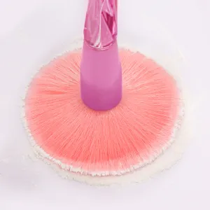 Pink kabuki makeup brush for loose powder, soft dense bristles for smooth cosmetic application.