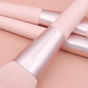 Professional pink makeup brush set for flawless powder, eyeshadow, and contour application.