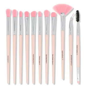 12-piece eye makeup brush set with soft pink handles for eyeshadow, blending, and eyeliner