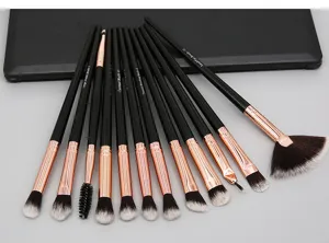 12-piece eye makeup brush set with soft synthetic bristles, black handles, and rose gold details.
