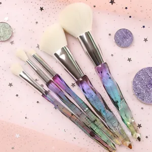Set de 5 brochas de maquillaje de cristal degradado para rostro y ojos profesionales.