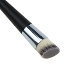 Angled foundation brush detail, soft dual-color synthetic bristles with silver ferrule.