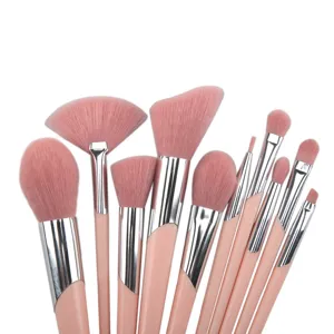 10-piece pink makeup brush set detail view, soft synthetic bristles and portable plastic handles.