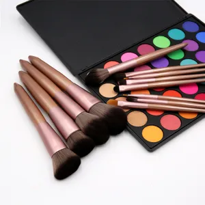 Detailed view of professional 12-piece makeup brush set with colorful eyeshadow palette.