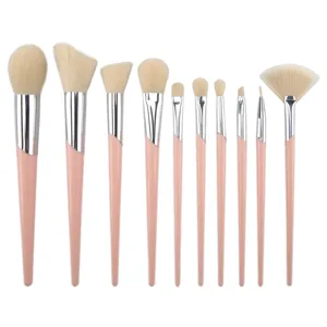 Professional 10-piece makeup brush set with pink handles and soft synthetic bristles for daily beauty.