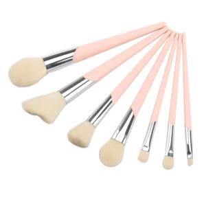 Pink makeup brush set with soft bristles, ideal for loose powder and eyeshadow application.