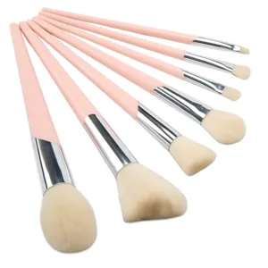 Detailed shot of soft pink handle makeup brush set with fine bristles for blending.