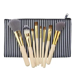 8-teiliges professionelles Pinselset mit praktischer schwarz-weißen Kosmetiktasche.