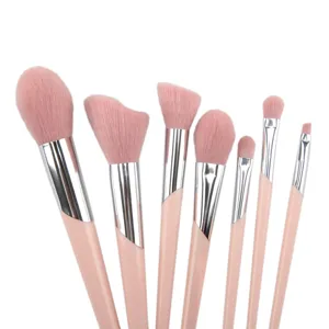 Professional pink makeup brush set detail close-up view, soft synthetic bristles with silver ferrule.