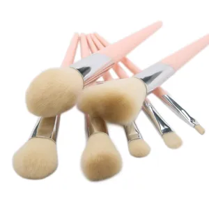 Pink makeup brush set with soft synthetic bristles and silver ferrules for face and eye makeup.