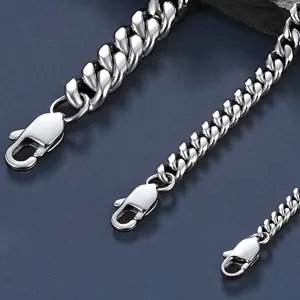 Stainless steel Cuban chain detail view, polished silver metallic finish with secure lobster clasp.