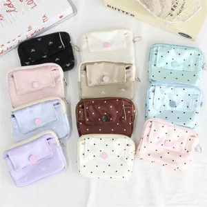 Cute polka dot bow coin purse multi-functional portable card case mini storage bag detail view.
