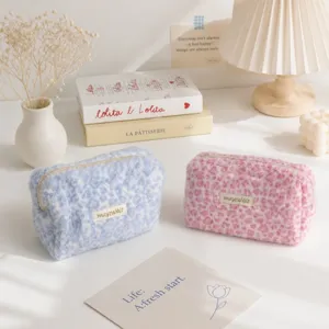 Fluffy leopard print cosmetic bag, soft plush makeup pouch for daily travel and portable storage.