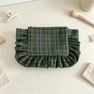 Vintage plaid cosmetic bag with elegant ruffles, large capacity canvas makeup pouch for women.
