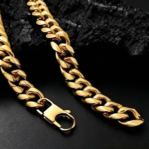Close-up macro view of the 18K gold plated stainless steel Cuban link chain necklace detail.