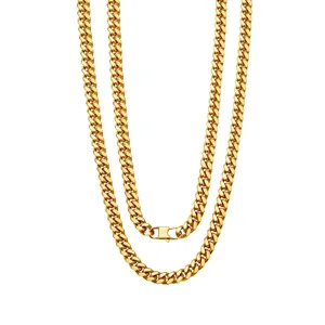 Close-up detail of double layered gold plated cuban link chain, smooth polished surface link