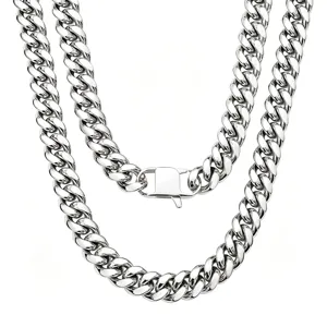 Detailed view of thick silver Cuban link chain necklace, durable stainless steel hip hop jewelry.