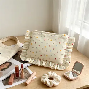 Floral cosmetic bag with cute ruffle edges, large capacity makeup storage pouch for daily use.